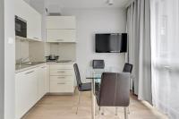 Kuchyňa alebo kuchynka v ubytovaní Dom & House - Apartamenty Sunrise