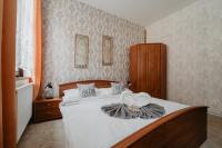 Postel nebo postele na pokoji v ubytování Hotel U Lípy