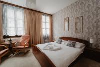 Postel nebo postele na pokoji v ubytování Hotel U Lípy