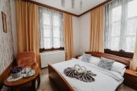 Postel nebo postele na pokoji v ubytování Hotel U Lípy
