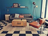 a living room with a couch and a coffee table at Backpackers Luzern in Luzern