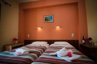 Postel nebo postele na pokoji v ubytování Margarita Aparthotel