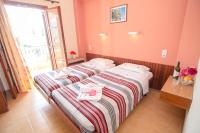 Postel nebo postele na pokoji v ubytování Margarita Aparthotel