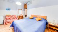 Posteľ alebo postele v izbe v ubytovaní Guest House Villa Nina