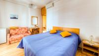 Posteľ alebo postele v izbe v ubytovaní Guest House Villa Nina