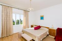 Posteľ alebo postele v izbe v ubytovaní Guest House Villa Nina