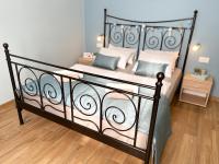 Posteľ alebo postele v izbe v ubytovaní Rooms Lucia