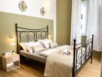 Posteľ alebo postele v izbe v ubytovaní Rooms Lucia