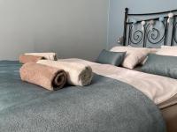 Posteľ alebo postele v izbe v ubytovaní Rooms Lucia