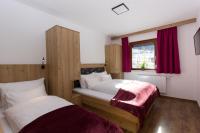 A bed or beds in a room at Reinthalers