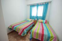 Posteľ alebo postele v izbe v ubytovaní Apartamentos Nuevo México M 45