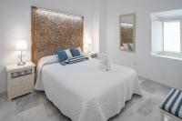 A bed or beds in a room at Apartamento Animalia