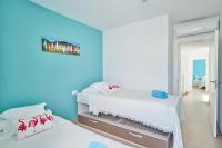 A bed or beds in a room at Villa Flamencos Rosas, Costa Adeje