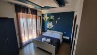 A bed or beds in a room at WiSaRelax