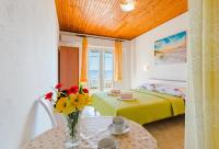 Posteľ alebo postele v izbe v ubytovaní Rooms Sani