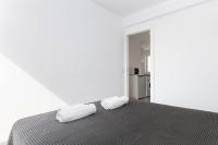 Posteľ alebo postele v izbe v ubytovaní YourHouse Monges Apartment with sea views