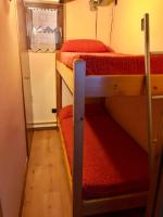 Postel nebo postele na pokoji v ubytování Camping Bungalows La Borda del Pubill