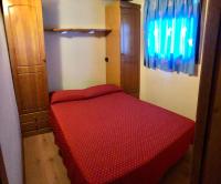 Postel nebo postele na pokoji v ubytování Camping Bungalows La Borda del Pubill
