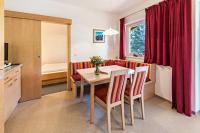 Telewizja i/lub zestaw kina domowego w obiekcie Ferienwohnung Helena
