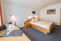 Łóżko lub łóżka w pokoju w obiekcie Ferienwohnung Helena