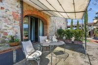 Patio lub wspólna przestrzeń na świeżym powietrzu w obiekcie Borgo Iesolana