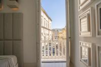 A bed or beds in a room at Palazzo Lecce - Epoca Collection