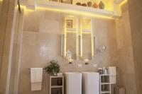 A bathroom at Palazzo Lecce - Epoca Collection