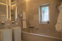 A bathroom at Palazzo Lecce - Epoca Collection