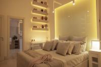 A bed or beds in a room at Palazzo Lecce - Epoca Collection
