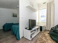 TV a/nebo společenská místnost v ubytování Holiday Home Skivillas 61 ukkohalla - b8 by Interhome