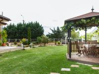A garden outside Apartment Twin front by Interhome