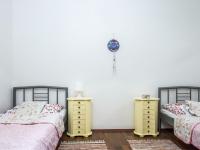 A bed or beds in a room at Apartment Twin front by Interhome