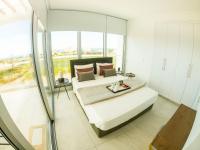 Postel nebo postele na pokoji v ubytování Imperial Jade Villas Gold Emerging Villas 3