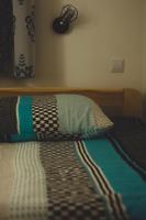 Posteľ alebo postele v izbe v ubytovaní Apartament Marcel