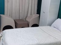 Postel nebo postele na pokoji v ubytování grand agata hostel