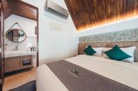 Poonsiri Varich Pool Villa Aonangにあるベッド