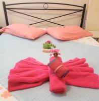 Postel nebo postele na pokoji v ubytování Corfu Town Family Apartment