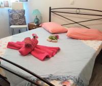Postel nebo postele na pokoji v ubytování Corfu Town Family Apartment