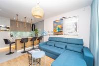 Posedenie v ubytovaní Bright and Blue 3city Apartment with Balcony in Gdynia by Noclegi Renters