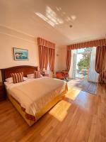 Posteľ alebo postele v izbe v ubytovaní Hotel Savoy