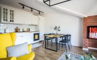 Kuchyňa alebo kuchynka v ubytovaní Apartamenty W37