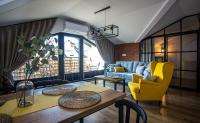Posedenie v ubytovaní Apartamenty W37