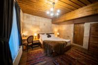 Postel nebo postele na pokoji v ubytování Duven Hotel Cappadocia
