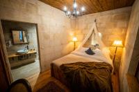 Postel nebo postele na pokoji v ubytování Duven Hotel Cappadocia