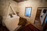 Postel nebo postele na pokoji v ubytování Duven Hotel Cappadocia