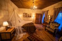 Postel nebo postele na pokoji v ubytování Duven Hotel Cappadocia