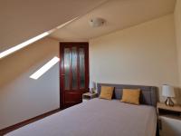 Posteľ alebo postele v izbe v ubytovaní Galery Apartman