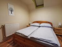 Posteľ alebo postele v izbe v ubytovaní Galery Apartman