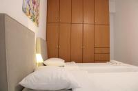 Postel nebo postele na pokoji v ubytování Kalamaki Plaza Apartments