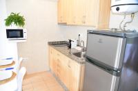 Kuchyňa alebo kuchynka v ubytovaní Apartamentos CostaMar 1; Apartamento nº11